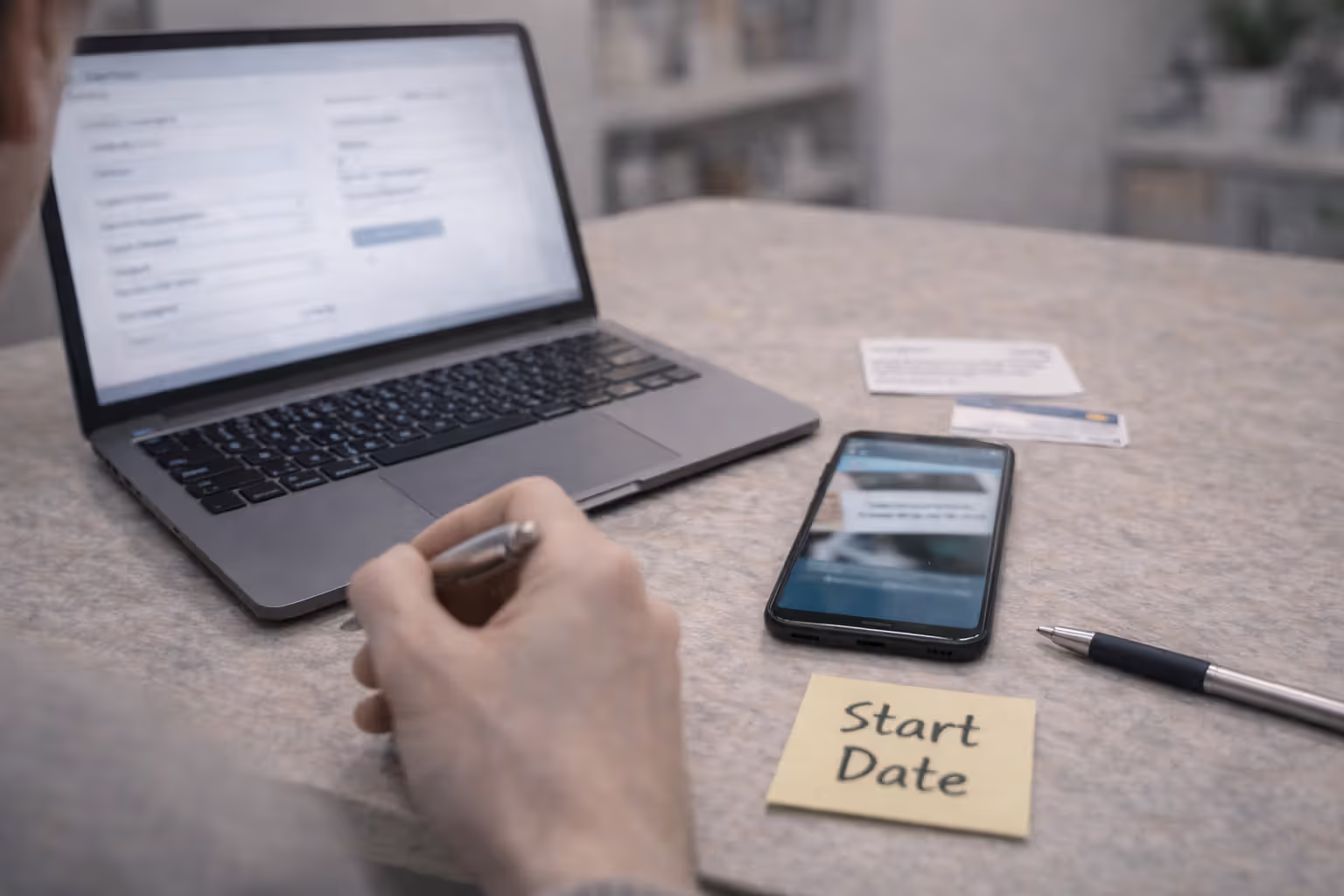 Filling out a blurred pet insurance application with pet ID details and vet contact info nearby